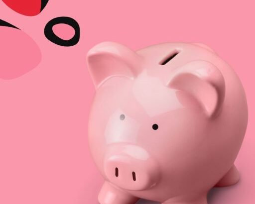 pink pig money bank on pink background