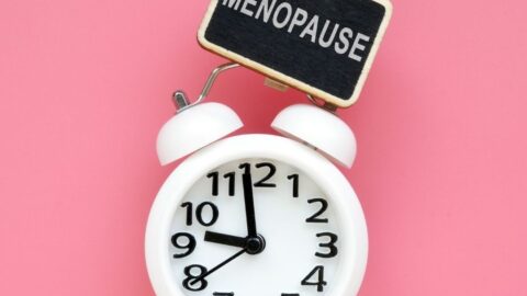 clock with a menopause sign on