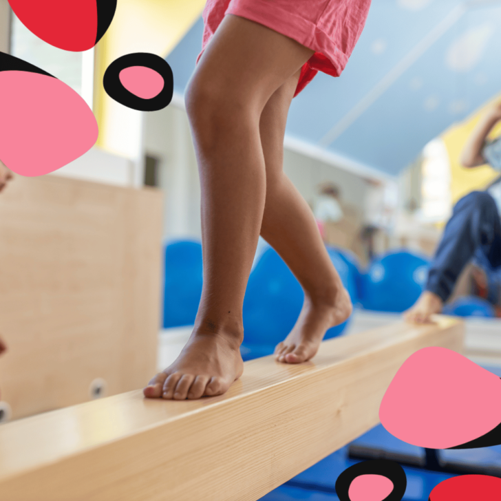 montessori balance beam with toddlers legs in shot on beam