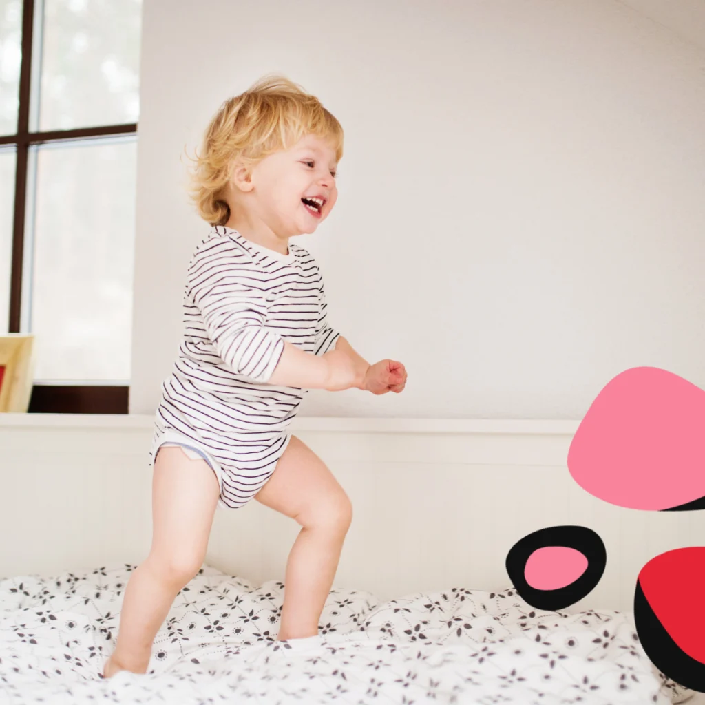toddler jumping on  bed The Ultimate Guide to Transitioning from Toddler to Big Kid Room