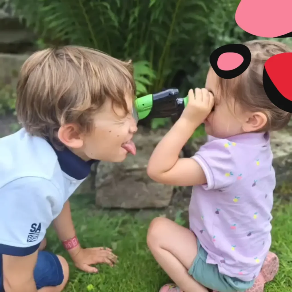 children on a bug hunt with a microscope