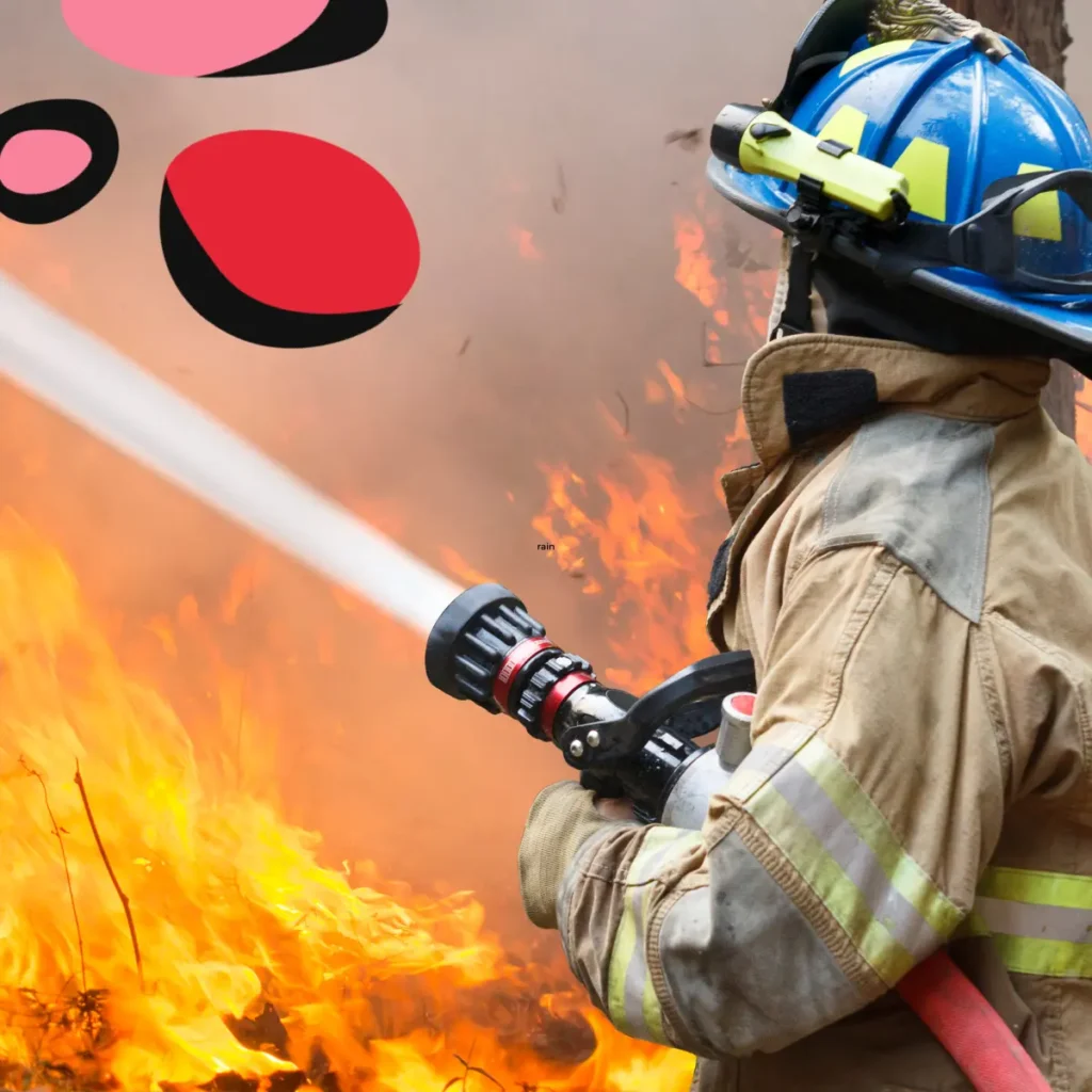 female firefighter fighting fire