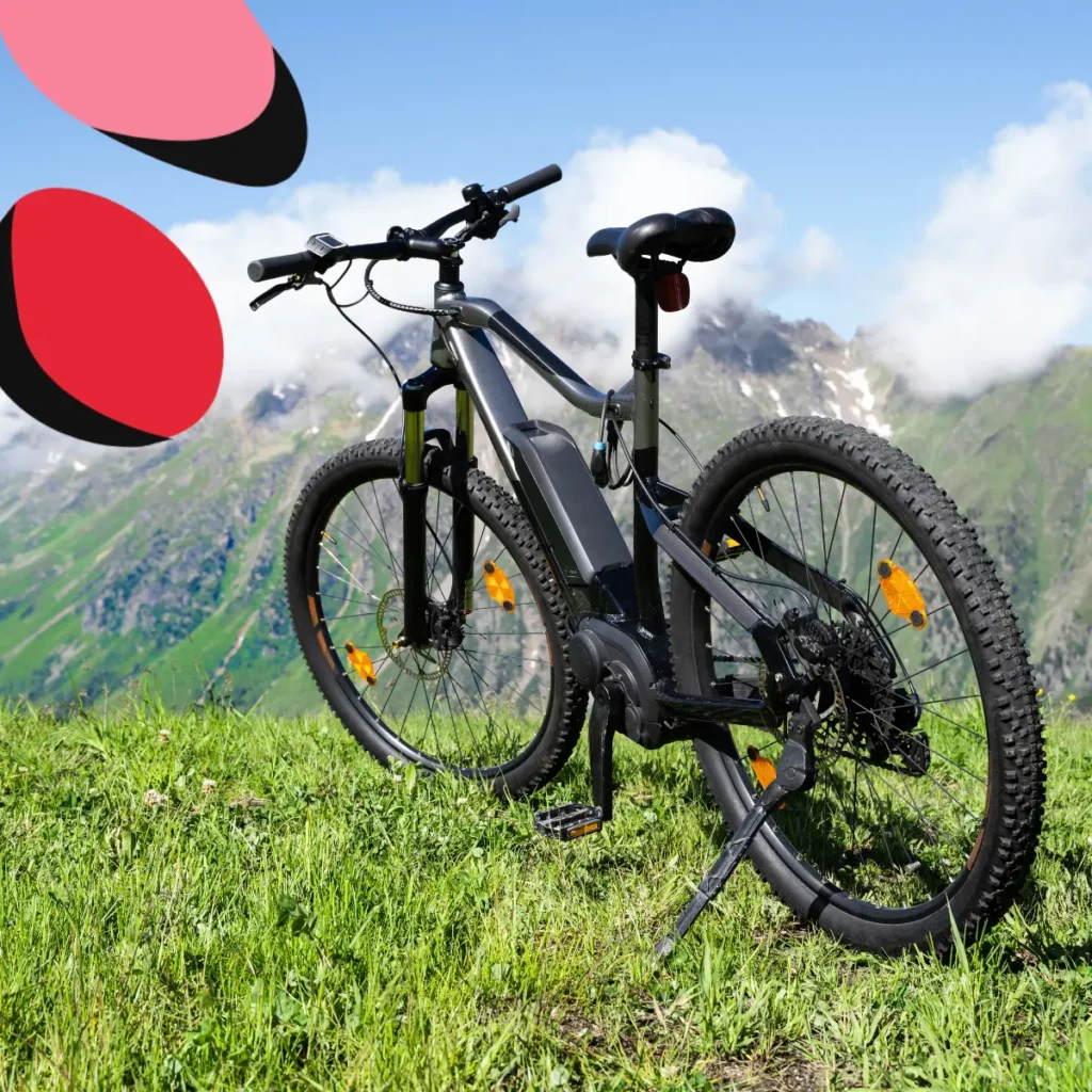 Tips for Cycling Safely in the Scottish Highlands with bike sat on a hill