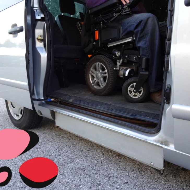 Wheelchair Accessible Vehicle with wheel chair being loaded in