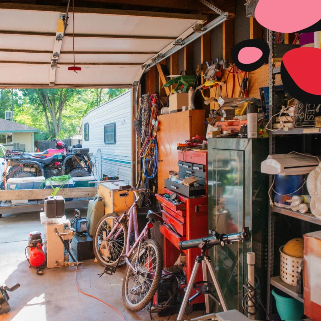 garage with shelves of tools and loads stuff