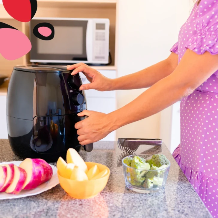mum with an air fryer on the counter